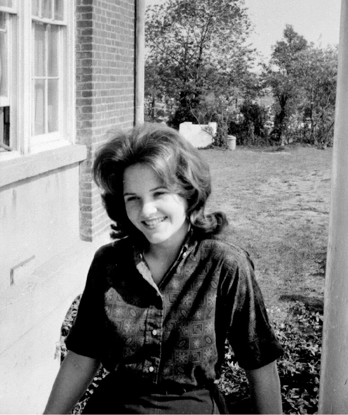 Helen Momsen on the porch at Bailey's Crossroads